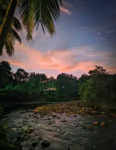 A serene sunset over the river at this riverside stay.