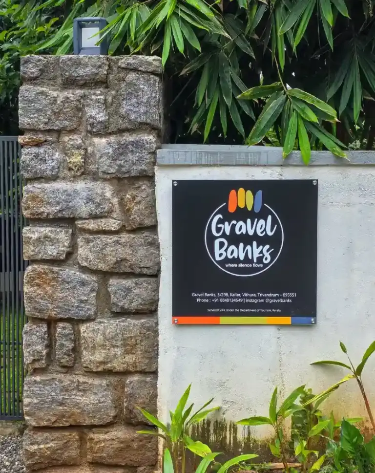 The entrance sign for Gravel Banks, a premium villa Kerala riverside.